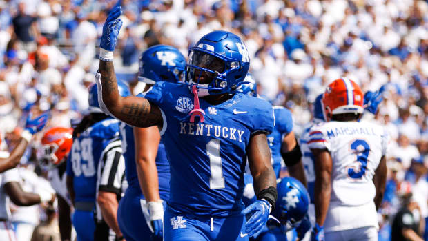 Kentucky Wildcats running back Ray Davis celebrates a touchdown against the Florida Gators.